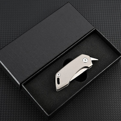 Couteau de Poche en Titane | Compact et Pratique pour Voyager