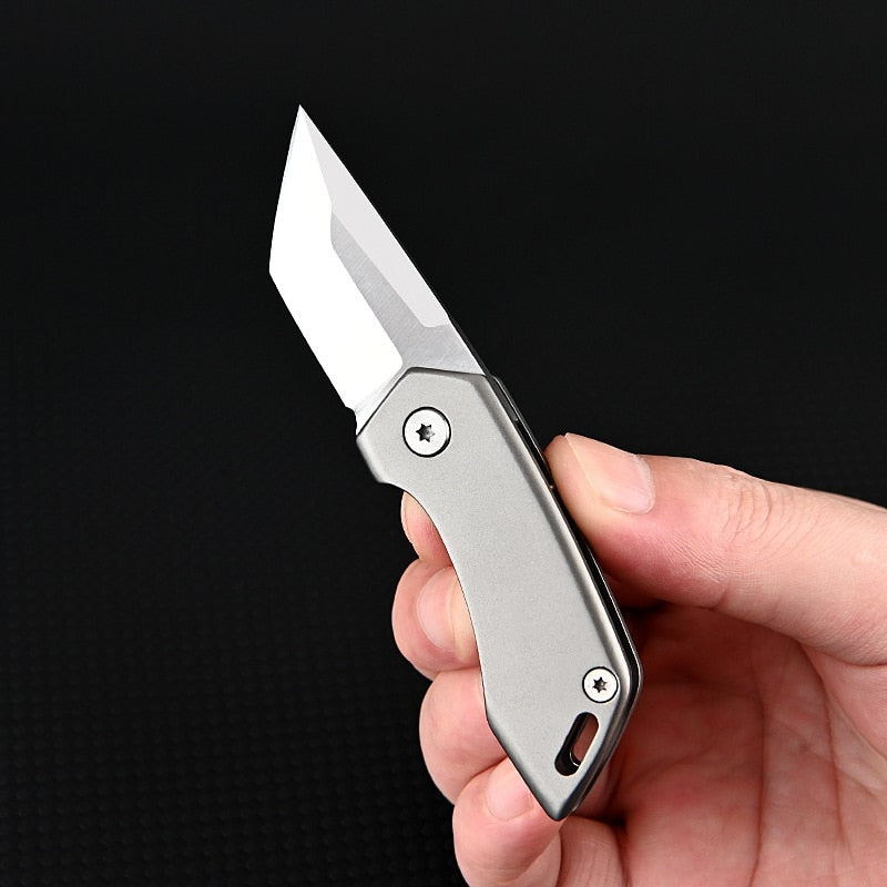 Couteau de Poche en Titane | Compact et Pratique pour Voyager