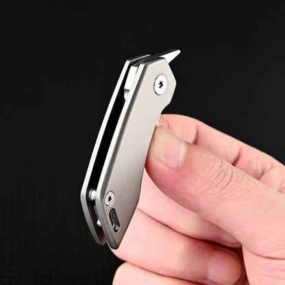 Couteau de Poche en Titane | Compact et Pratique pour Voyager