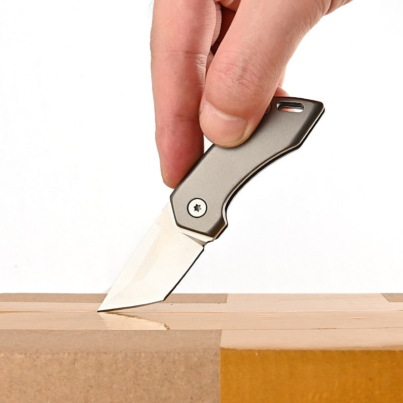 Couteau de Poche en Titane | Compact et Pratique pour Voyager